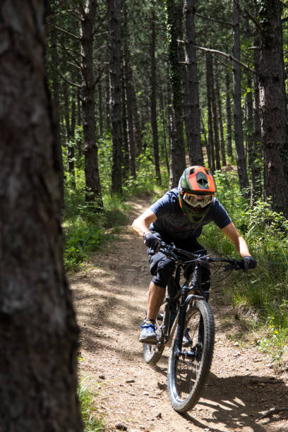 istock Man going fast on mountain bike 1225210771