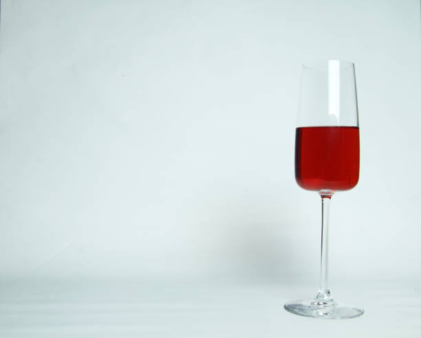 istock a glass of red wine isolated on white background 1225211163