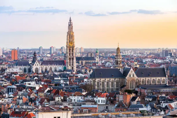 Aerial high angle view landscape of Antwerp cityscape with cathedral of Our Lady, Antwerpen Belgium sunset. EU Belgium city landmark for tourism and travel destination.