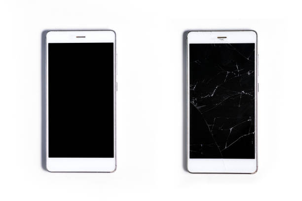 istock Two modern mobile touch smartphones. Whole and with a broken glass screen, isolated on a white background. Service, repair and technological concept. Copy space for text. View from top. 1225215507
