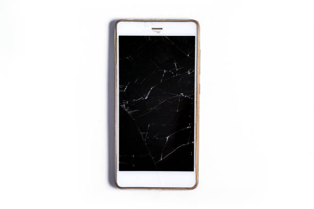 istock A modern mobile touch smartphone with a broken glass screen isolated on a white background. Service, repair and technological concept. Copy space for text. 1225215529