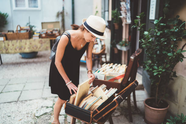 istock Woman buying books in Budapest 1225215582