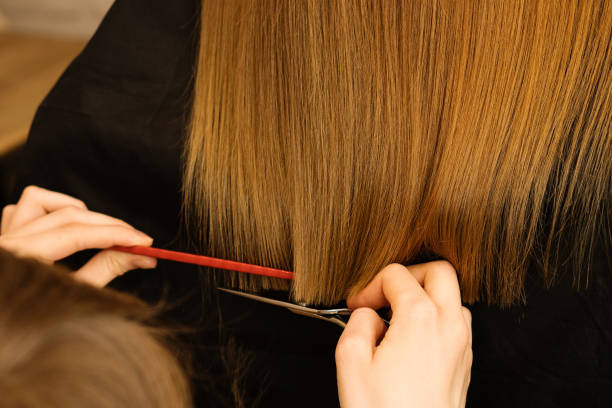 istock Scissors cut girls hair 1225215857