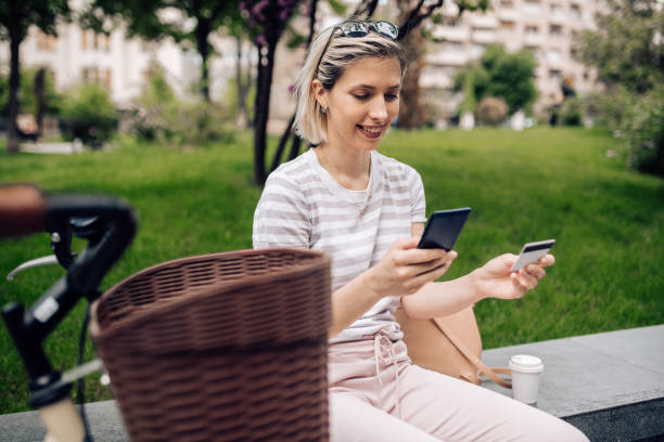 istock Young woman checking her bank account 1225215956