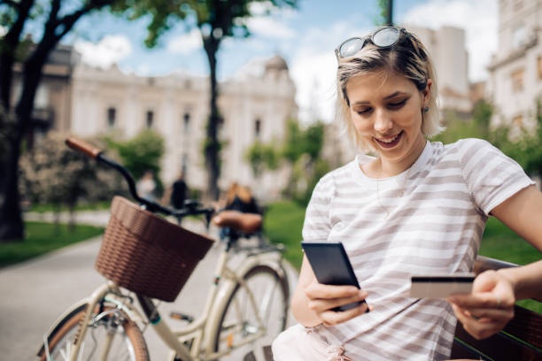 istock Young woman checking her bank account 1225216490