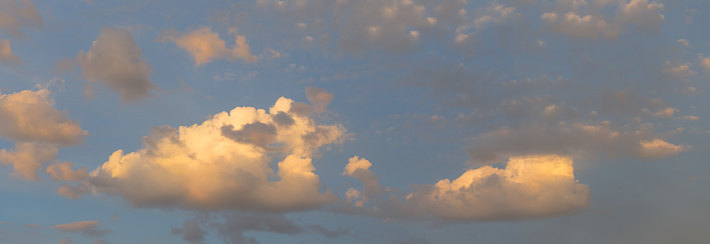 cumulus clouds on evening sky, outdoor sky background
