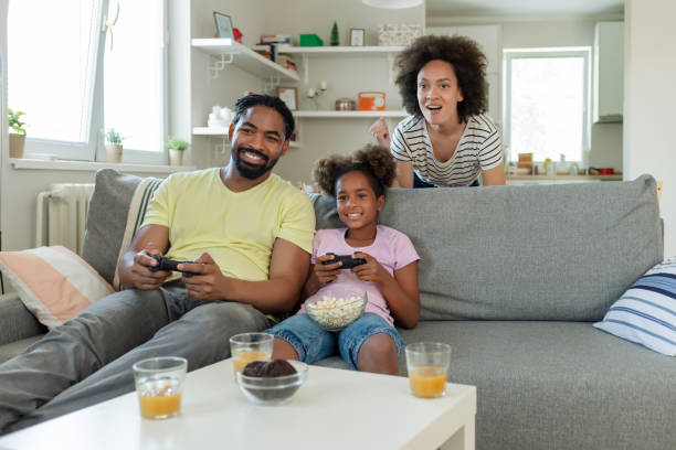 istock Family Playing Video Games 1225220056