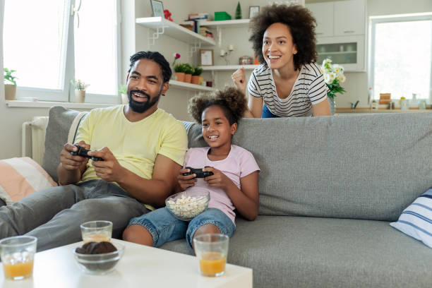 istock Family Playing Video Games 1225220057