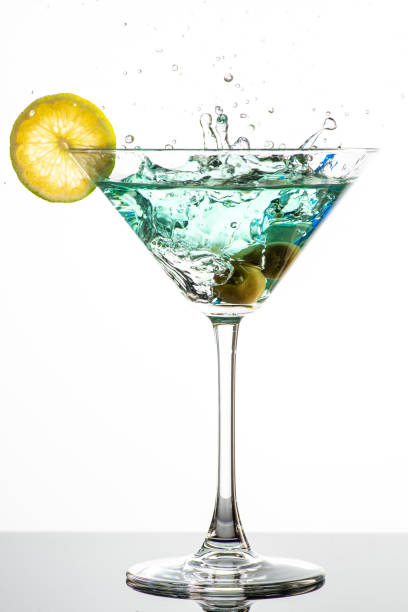 istock cocktail with martini, olives and lime wedge 1225220652