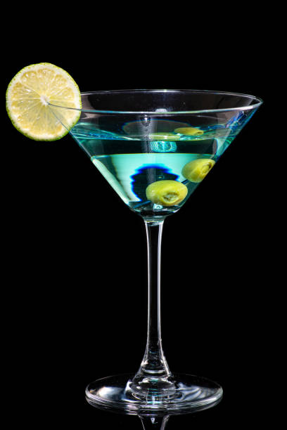 istock cocktail with martini, olives and lime wedge 1225220660