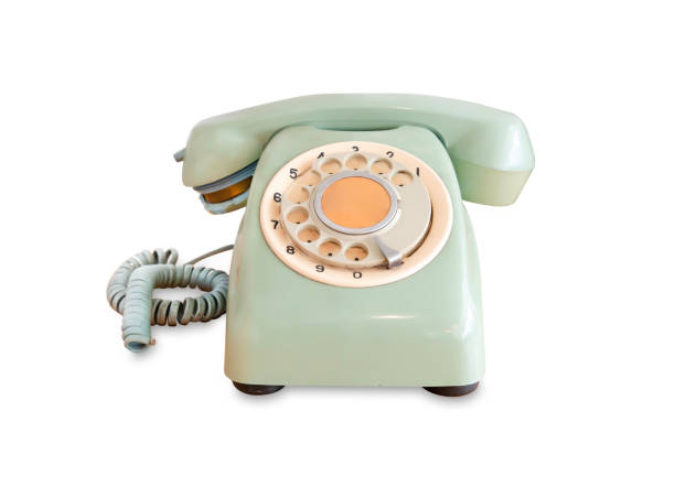 istock Old broken green rotary phone isolated on white background with clipping path 1225221297