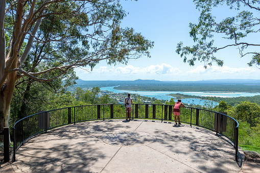 Noosa National Park, Queensland, Australia; January 29th, 2020 - Tourists overlooking the view of Noosa from the Laguna Lookout in Noosa National Park.