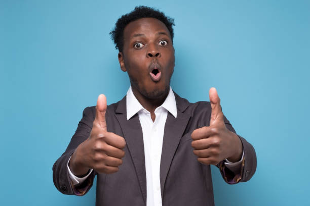 istock Confident african american business man gesturing a thumbs up 1225223494