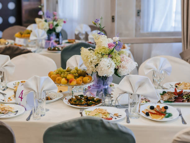 istock festive table in the restaurant with plates, glasses and Cutlery on a white tablecloth 1225224574