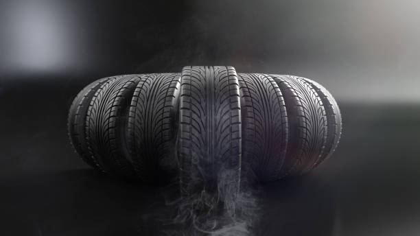 istock car wheels on black background. Poster or cover design. 3D rendering illustration. 1225224768