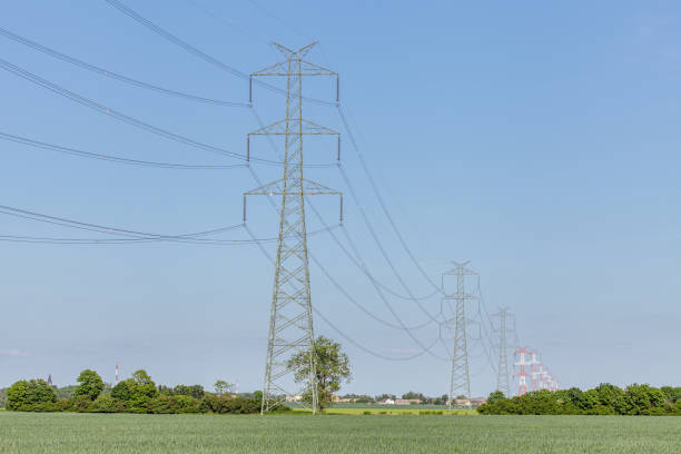 istock High voltage transmission line against clear blue sky 1225225697