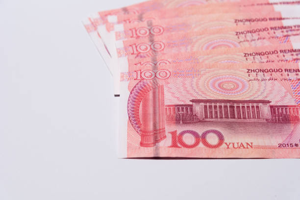 istock Chinese yuan 100 yuan banknotes on white background 1225225739