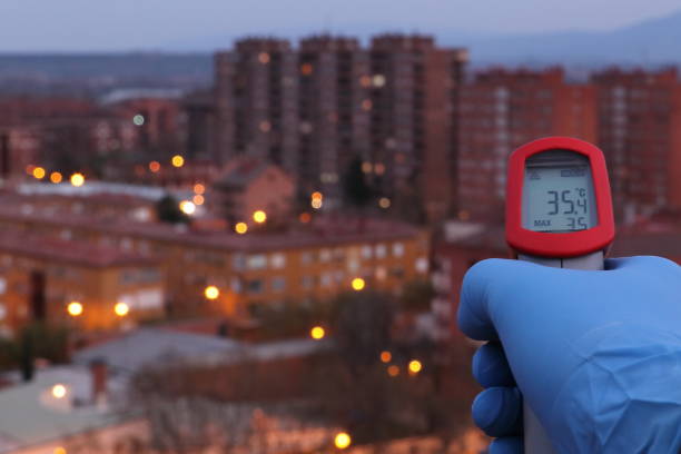 istock COVID 19 THERMOMETER CORONAVIRUS TAKE TEMPERATURE 1225227142