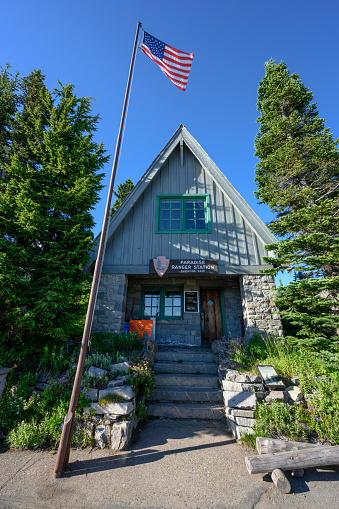 Mount Rainier National Park, United States: July 25, 2019: Paradise Ranger Station Flies Flag in Popular area of the park
