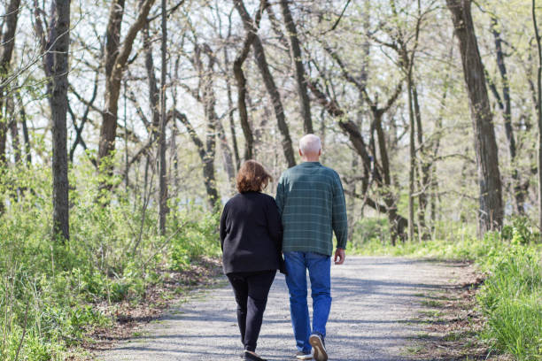 istock Older Couple Spending Time Outdoors 1225228376