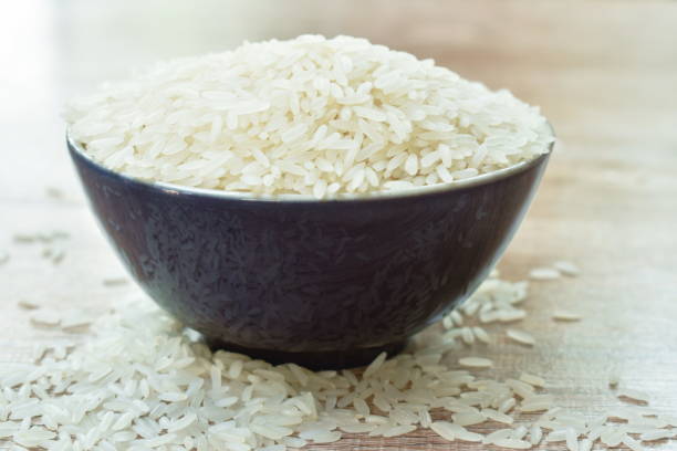 istock Thai jasmine rice paddy in bowl on table 1225229175