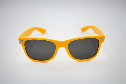 This series features several sunglasses of different colors and in different positions on a white background