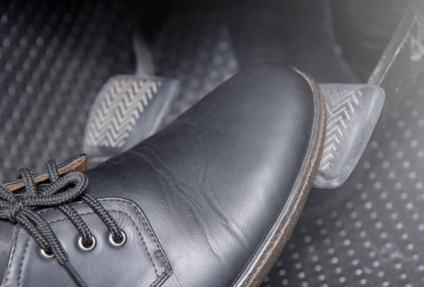 Classic brown leather loafers with detailed stitching, showcasing their timeless design.