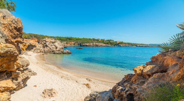 istock Blue sky over rocks and sand in Alghero shore 1225241159