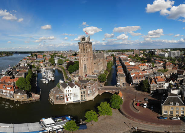 Dordrecht Netherlands, skyline of the old city of Dordrecht with church and canal buildings in the Netherlands Dordrecht Netherlands, skyline of the old city of Dordrecht with church and canal buildings in the Netherlands Europe dordrecht photos stock pictures, royalty-free photos & images