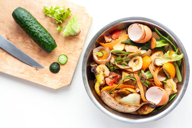 istock Food waste in iron bowl and cutting board 1225253917