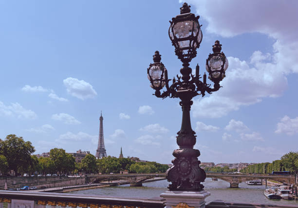 istock Alexander III bridge with Eiffel tower on the background 1225254082
