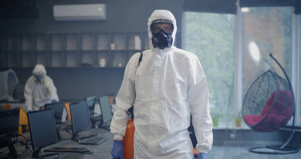 istock Decontamination personnel looking at camera 1225255332