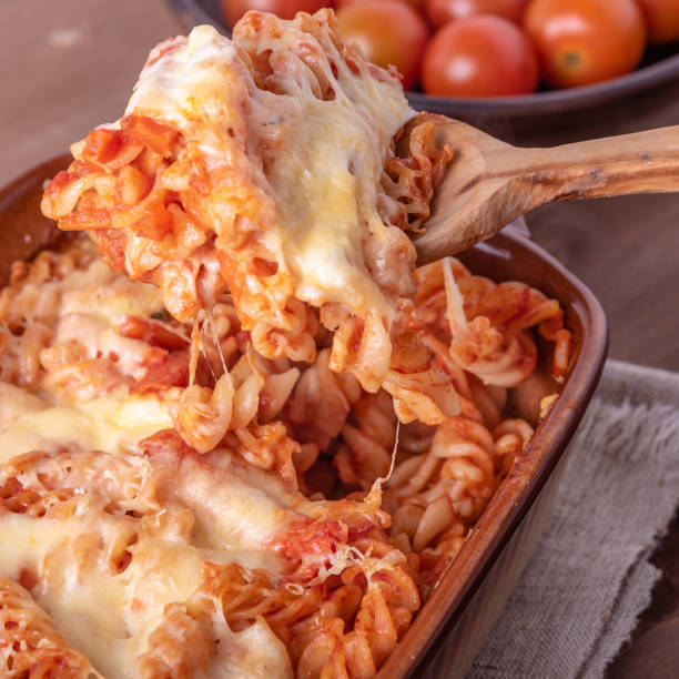 istock Classical Italian fusilli in a baking dish baked with tomato sauce and mozzarella and parmesan cheese 1225263365