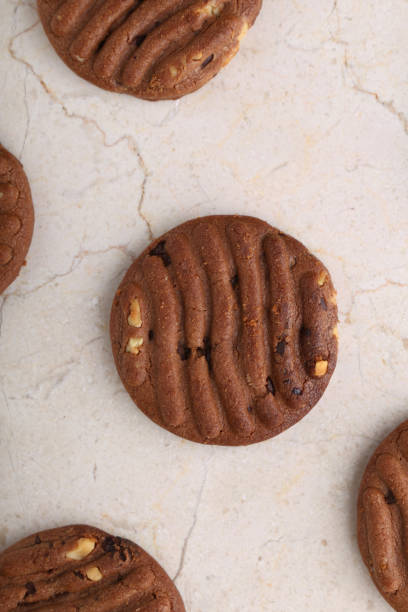 istock Flat lay composition with chocolate cookies and space for text on marble background 1225266680