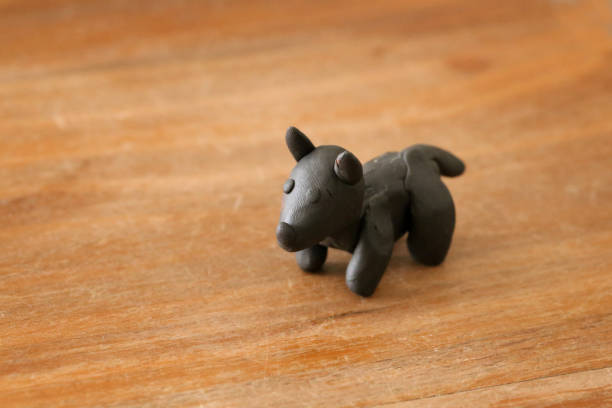 istock Animals fashioned by children from plasticine - a dog 1225269929