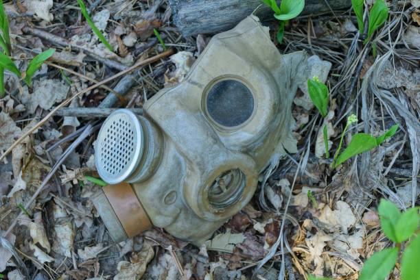 istock garbage from one green rubber old gas mask 1225277253
