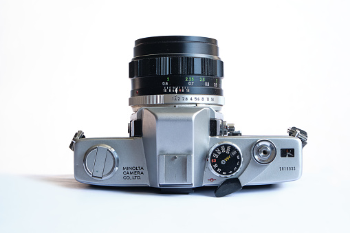 London / UK - May 16, 2020: Minolta SR-T 101 with MC Rokkor-PF 1:1.4 f=58mm vintage 35mm analog film camera, launched in 1966. Top view.