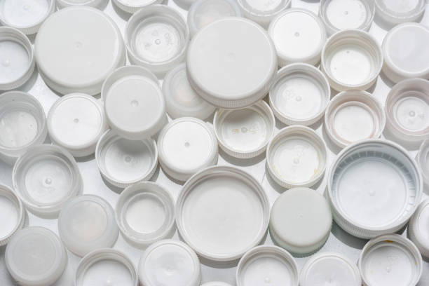 istock White plastic bottle caps for recycling seen from above 1225289979