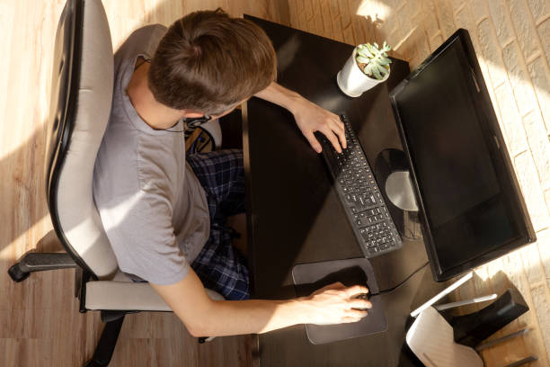 istock Top view of businessman working on pc. 1225290506
