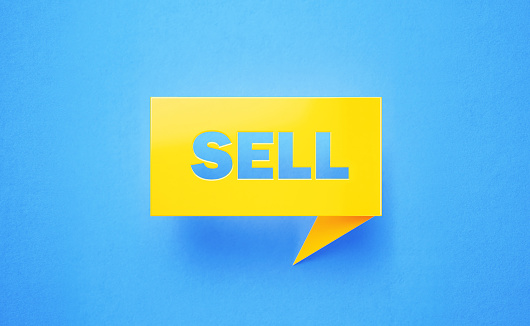 Sell written yellow chat bubble on blue background. Horizontal composition with copy space. Finance concept.