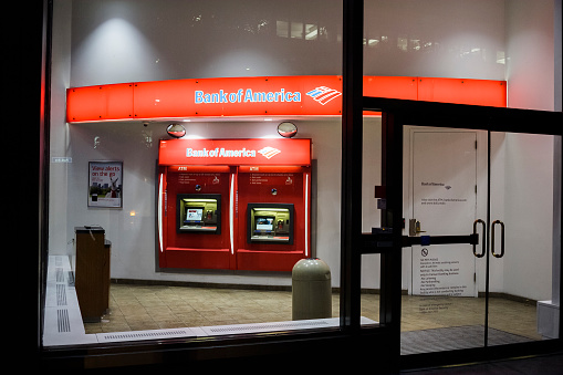 New York, New York, USA - July 15, 2016: A Bank of America ATM branch at night in New York City