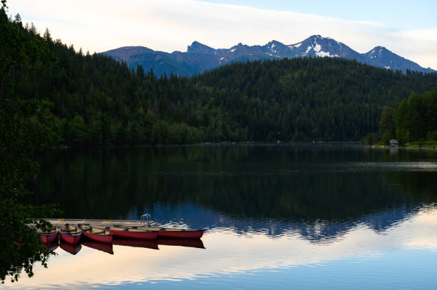 istock Canoes on a pristine mountain lake 1225302596
