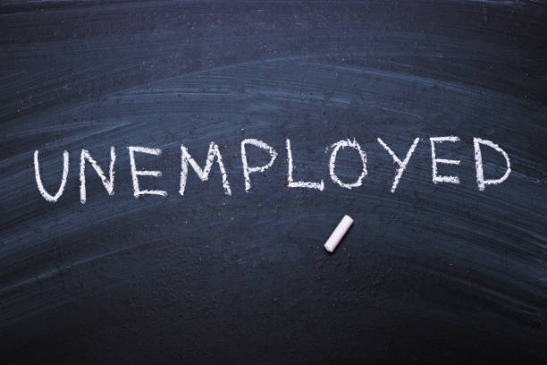 istock The word unemployed written in chalk. 1225309631