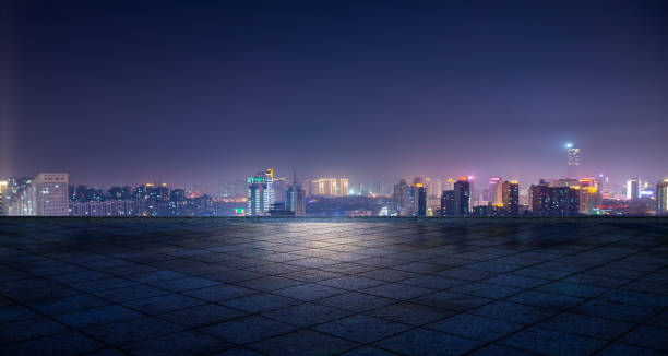 nachtansicht der stadtlichter vor dem marmorplatz, xuzhou, china - city night china lighting equipment stock-fotos und bilder