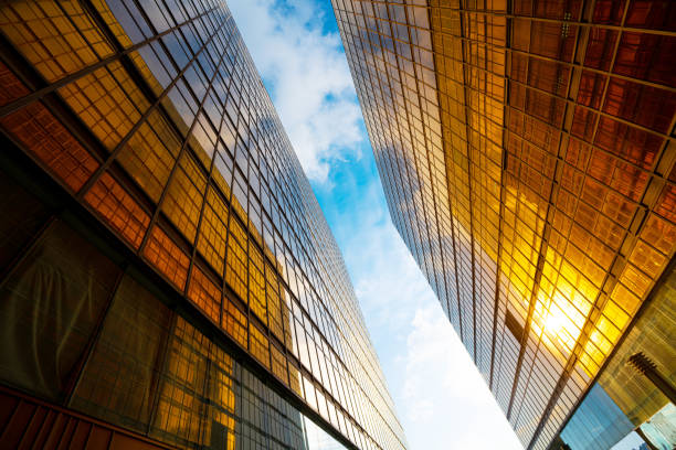 istock Modern buildings with gold and glass facades 1225317924