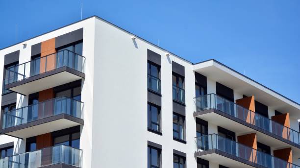 istock Modern condo building with big windows and modern facade. 1225318713