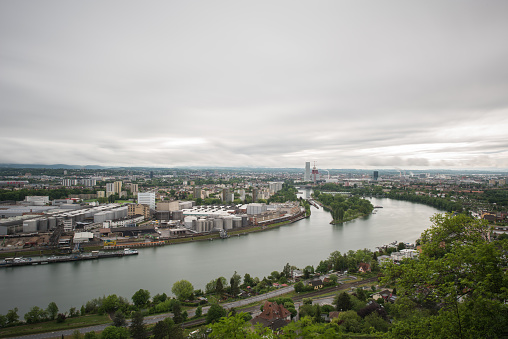 view of the rhine river and the city of basel in switzerland, the picture was taken in neighboring germany