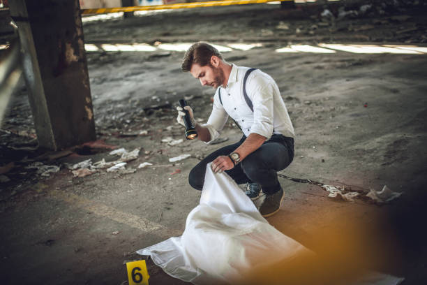 istock After the murder, criminal inspectors work at the crime scene 1225326299