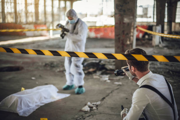 istock After the murder, criminal inspectors work at the crime scene 1225326480