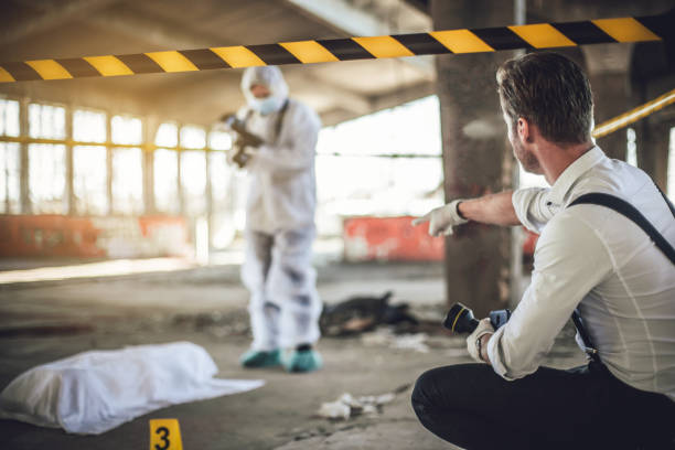 istock After the murder, criminal inspectors work at the crime scene 1225326501